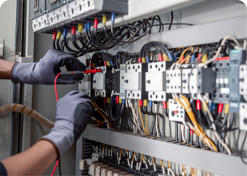 Electrician working on circuit breaker panel