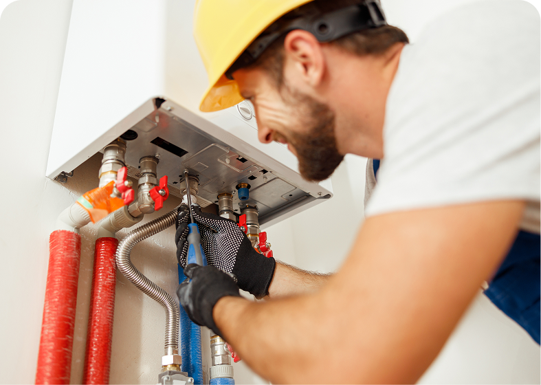Technician repairing plumbing connections