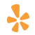 Orange asterisk symbol on a white background.